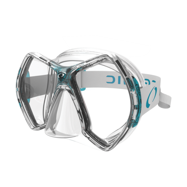 Side front angle of the Oceanic Cyanea Dive Mask in clear/aqua, showcasing its twin-lens design, soft silicone skirt, and ski-goggle-style strap.