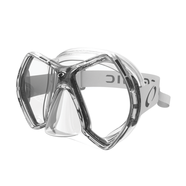 Side front angle of the Oceanic Cyanea Dive Mask in clear-titanium, showcasing its twin-lens design, soft silicone skirt, and ski-goggle-style strap.