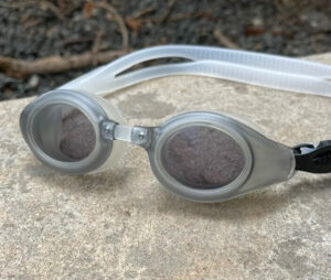 Shark Swim Goggle with grey frame and grey tinted prescription-ready lenses, designed for comfort and clarity in bright swimming conditions